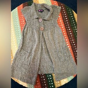 Brown sweater vest